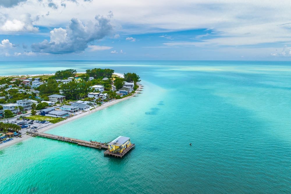 Aerial overview of a pier and the bay at Anna Maria Island