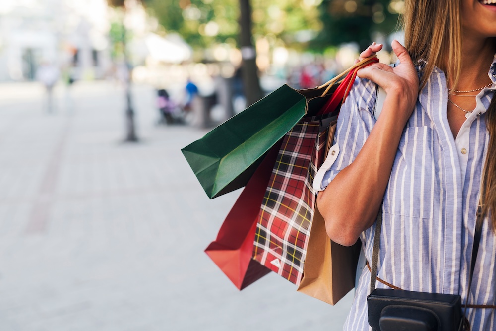 A woman carrying shopping bags