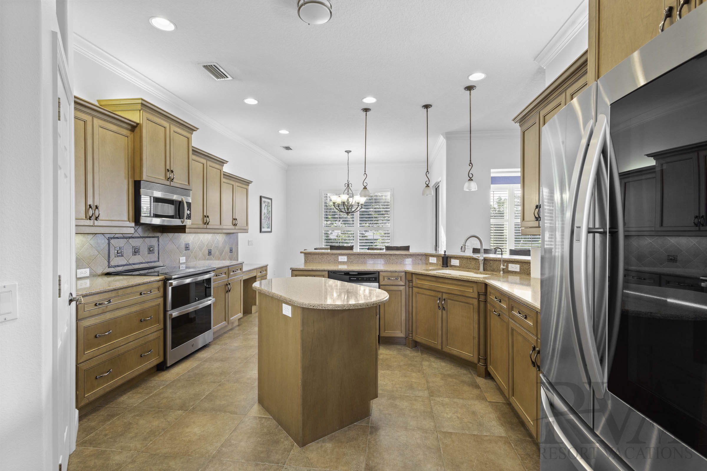 Modern full kitchen at Silverado Circle with stainless steel appliances
