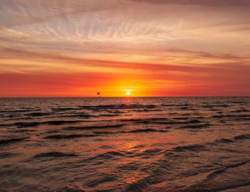 Calm ocean water at sunset