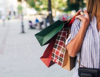 A woman carrying shopping bags