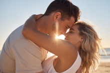 couple embracing on beach