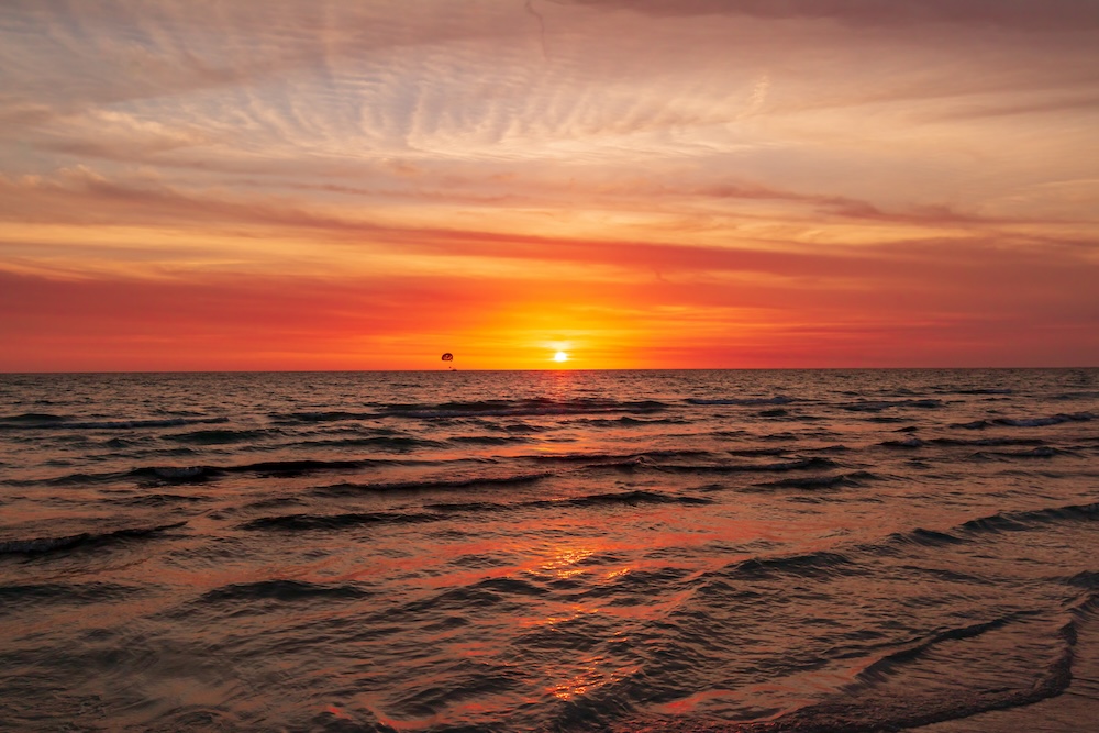 Calm ocean water at sunset